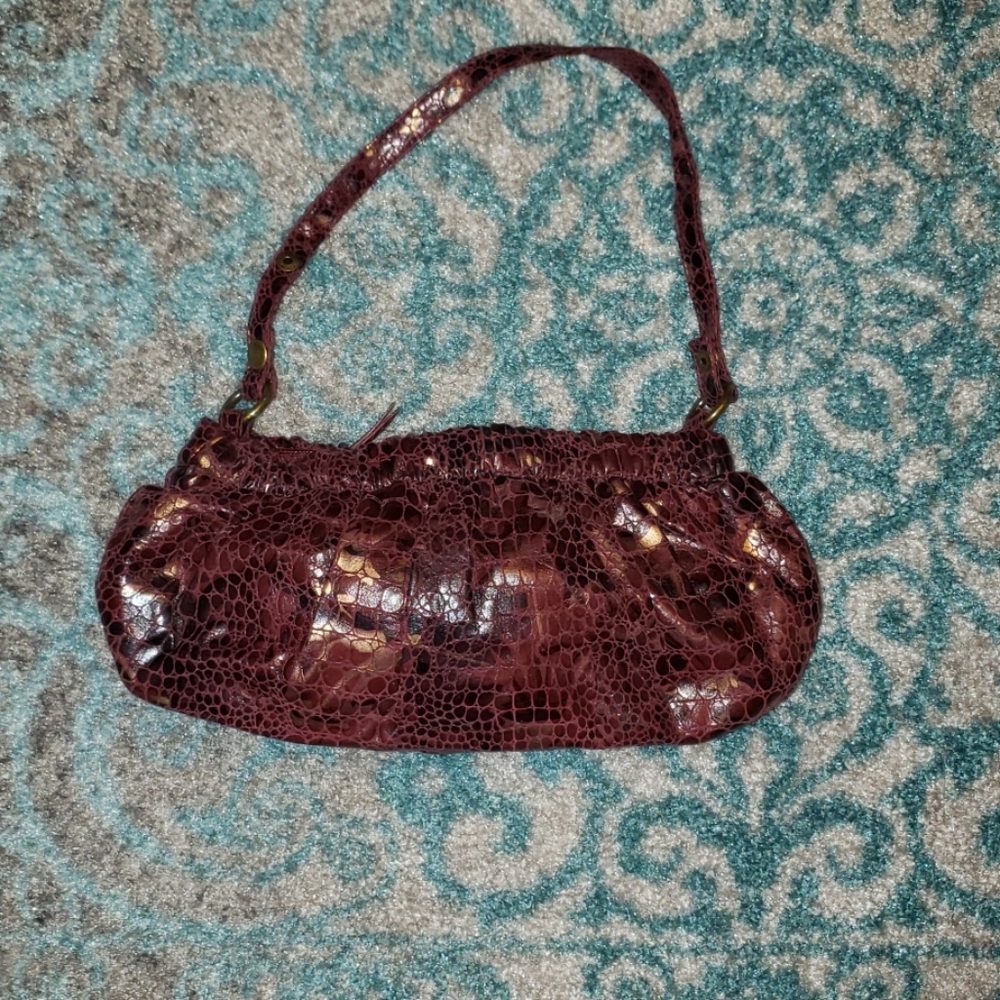 Necessary Objects burgundy and gold snakeskin bag